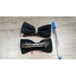 Broche para pelo de cuero negro en forma de moña