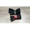 Broche para pelo de cuero negro en forma de moña